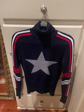 ANTONIO MELANI Navy Turtleneck Sweater with White Star & Red Stripe Detail